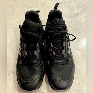Black Adidas walking sneakers. Size 8 men, worn twice, great condition.